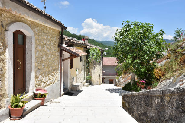Travel in old italian villages Cerro al Volturno, Italy, 06/02/2018. A narrow street between the small houses of a medieval village in the Molise region ancient villages stock pictures, royalty-free photos & images