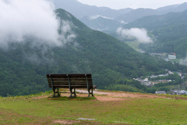Bench where you can see the haze in the mountains