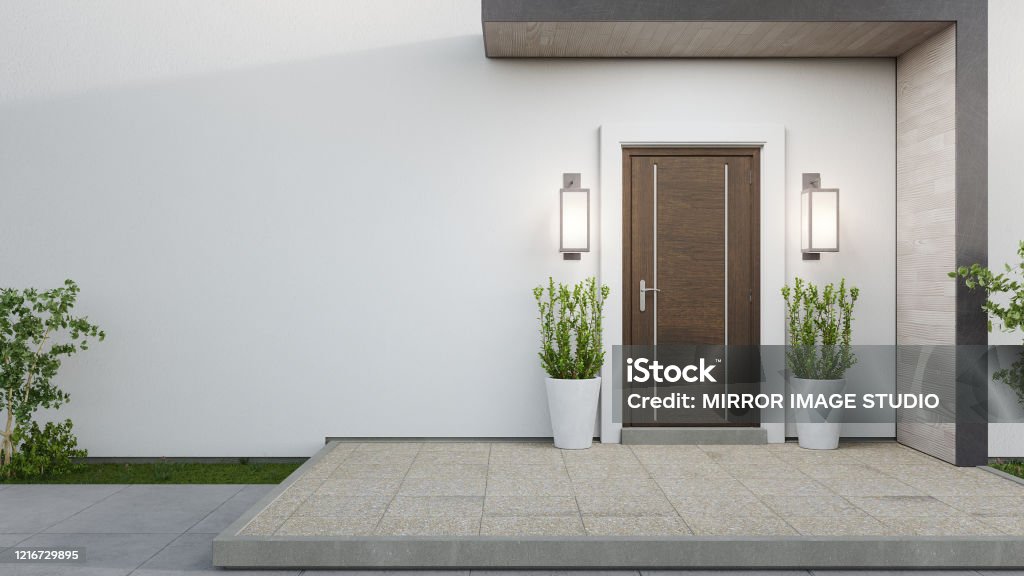 New house with wooden door and empty white wall. 3d rendering of large patio in modern home. House Stock Photo