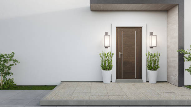 New house with wooden door and empty white wall. 3d rendering of large patio in modern home. modern stock pictures, royalty-free photos & images