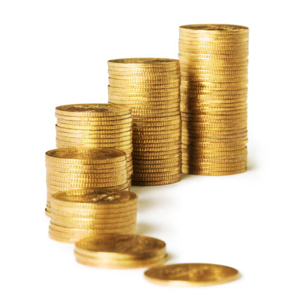istock Incresing golden coin stacks on white 1216731266