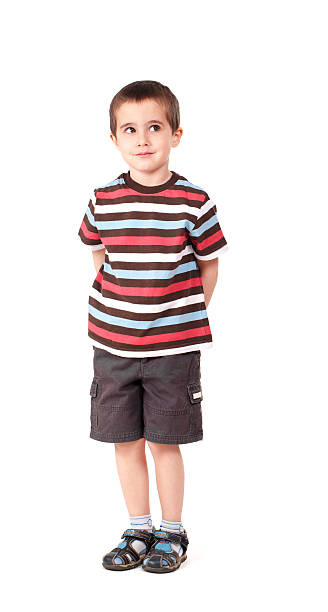 istock Single naughty little boy looking outside upwards 121673138