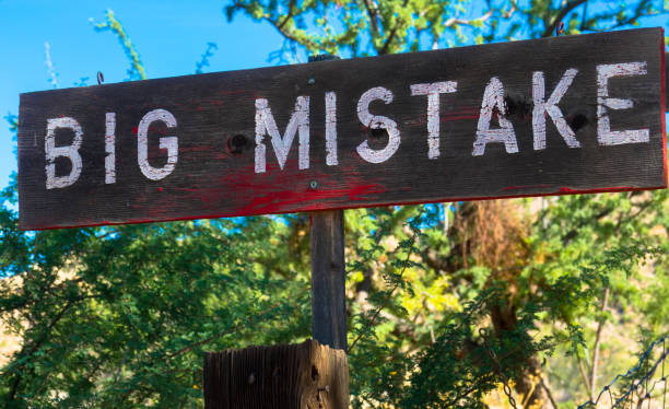 istock big mistake wooden sign in the nature 1216740721
