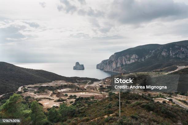 Masua And Pan Di Zucchero Stock Photo - Download Image Now - Beauty In Nature, Cliff, Coastline