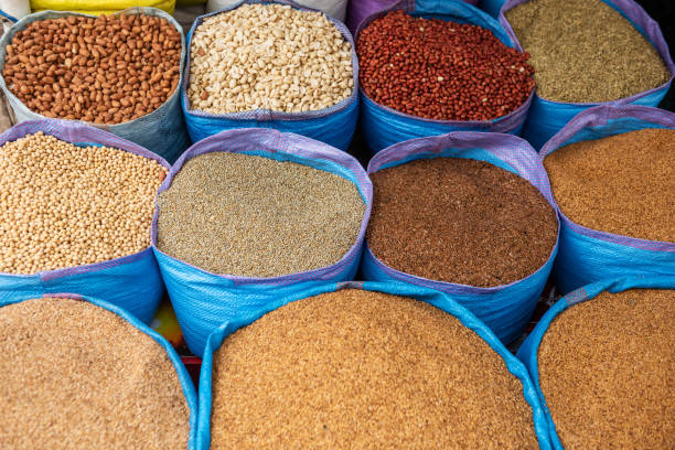 Morocco: Different kinds of legumes and spices in different colours on a market in Morocco.