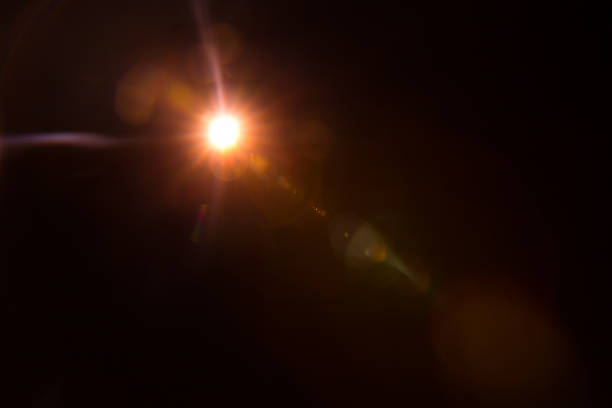 istock Abstract Natural Sun flare on the black 1216744855