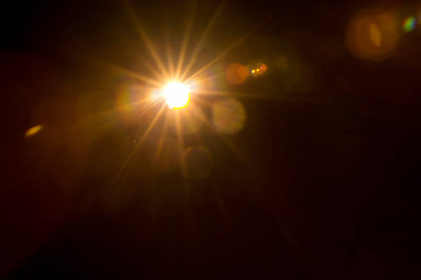 istock Abstract Natural Sun flare on the black 1216744860