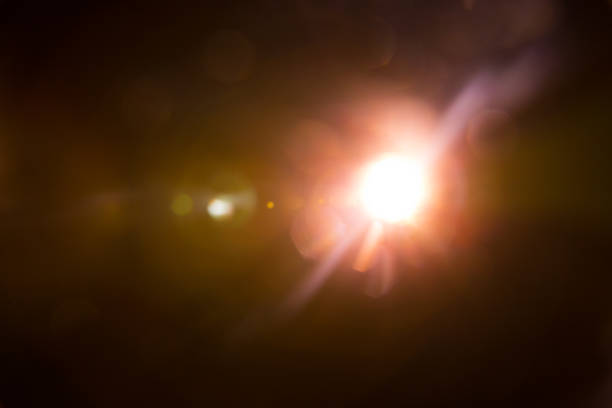 istock Abstract Natural Sun flare on the black 1216744920