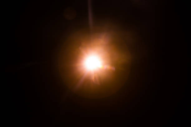 istock Abstract Natural Sun flare on the black 1216744926