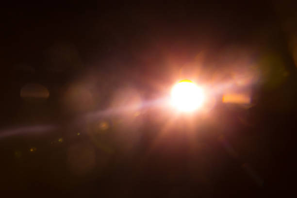 istock Abstract Natural Sun flare on the black 1216744939