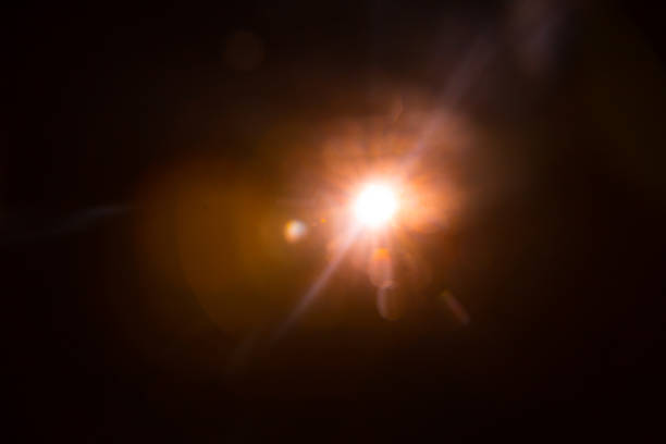 istock Abstract Natural Sun flare on the black 1216744945
