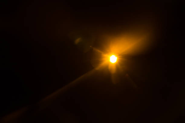 istock Abstract Natural Sun flare on the black 1216745466
