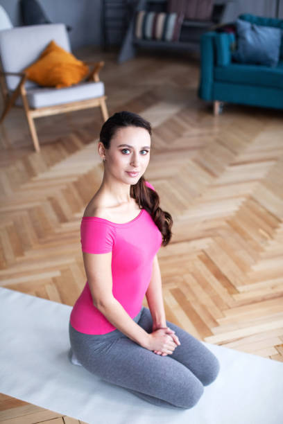 istock Woman doing exercises indoors. 1216748930