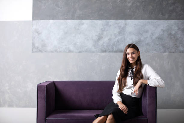 istock Woman office worker sitting on a sofa. 1216748962
