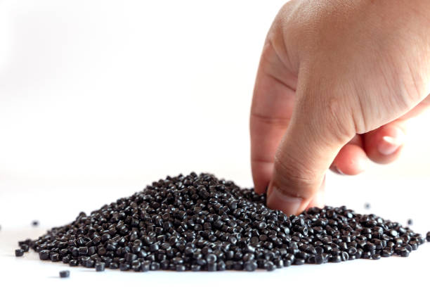 istock Close-up of plastic polymer granules. hand hold Polymer pellets. polymer plastic. compound polymer. 1216751547