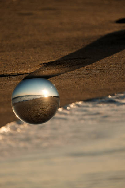 istock Crystal ball on the beach of Salento 1216752990