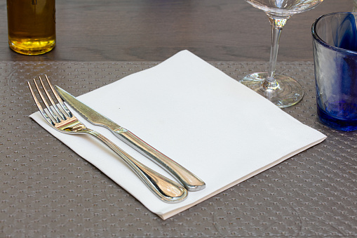 Table with cutlery in a restaurant