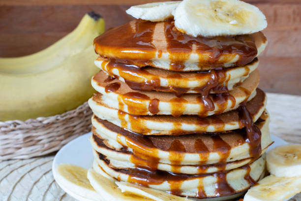 istock Pancakes with bananas and caramel sauce 1216754201