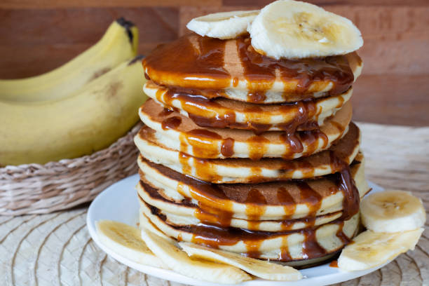istock Pancakes with bananas and caramel sauce 1216754203
