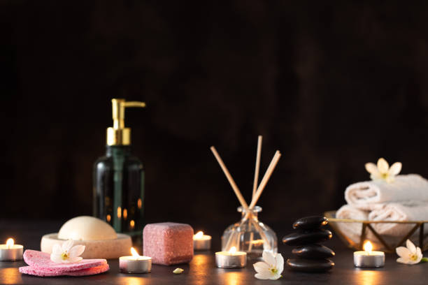 istock Spa stone massage. Black background. Spa treatment. 1216755332