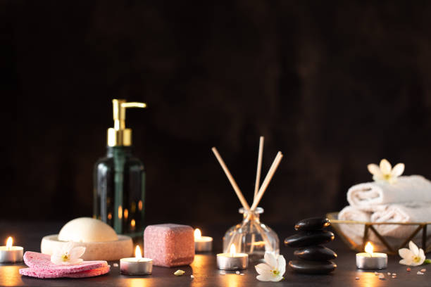 istock Spa stone massage. Black background. Spa treatment. 1216755525
