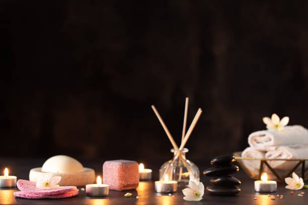 istock Spa stone massage. Black background. Spa treatment. 1216755630