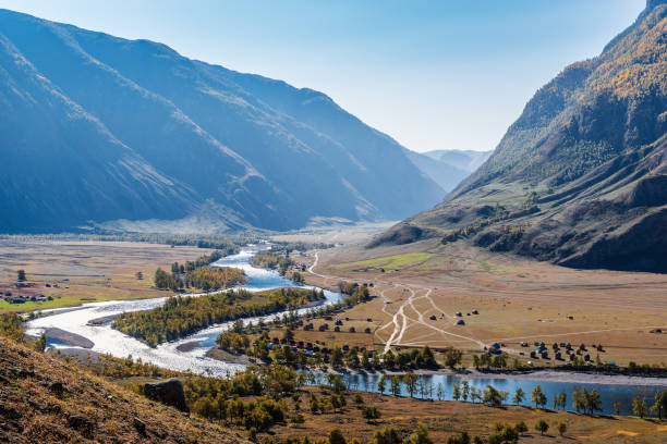 istock Chalet on the river bank in a mountain valley 1216755683