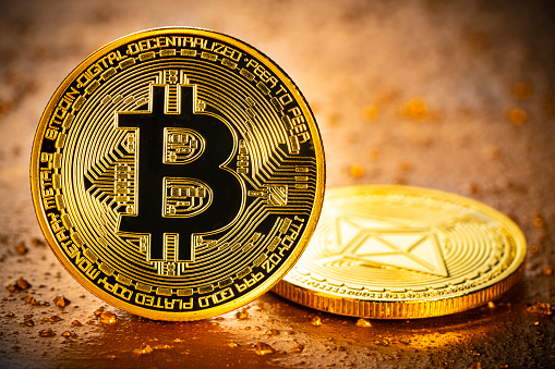 Bitcoin and Ethereum cryptocurrency blockchain closeup macro