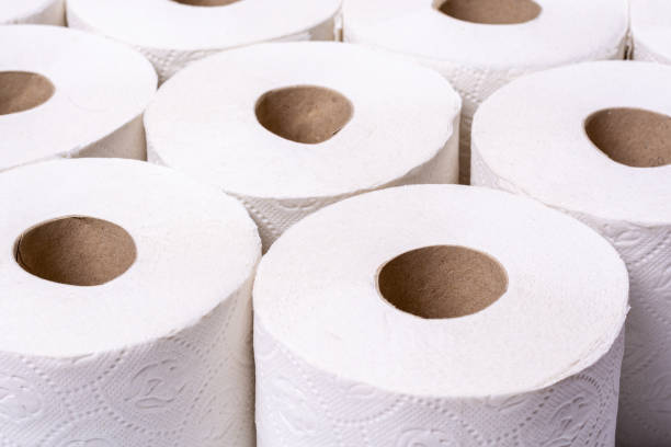 istock Piled up toilet paper rolls as a close up from the front at an angle 1216756448