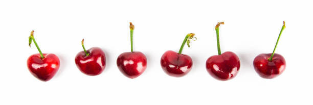 Overhead view of cherry isolated on white background. Overhead view, top view,cherry, prunus pseudocerasus, healthy eating red above studio shot stock pictures, royalty-free photos & images