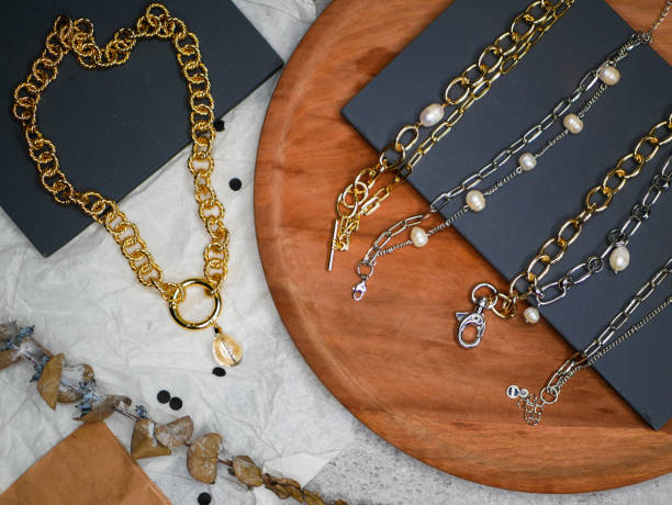 istock Gold chains. Valentines Day. A precious gift from your beloved on Valentines Day. valuable jewelry. Purchases of precious metals. Flat lay 1216758228