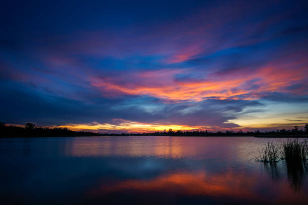 istock Sunset at the lake landscape 1216759308