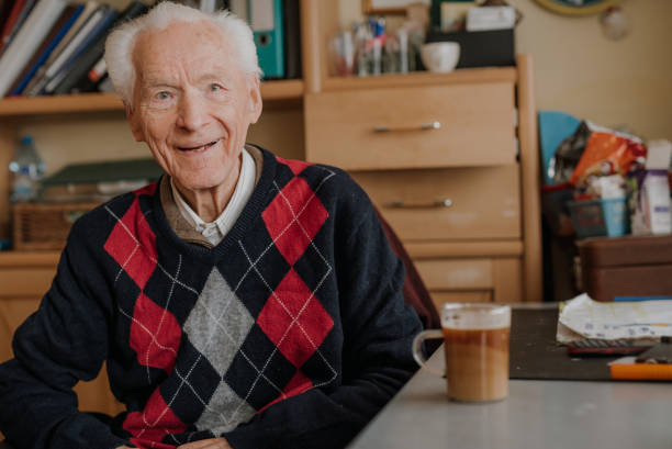 istock Portrait of happy senior drinking coffee 1216760730