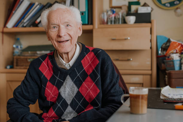 istock Portrait of happy senior drinking coffee 1216760739