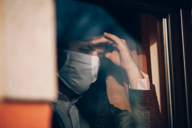 istock Man working from home and worried about covid-19 coronavirus 1216761916
