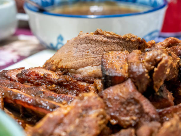 Freshly roasted succulent beef brisket chunks, served on a plate as a catering concept