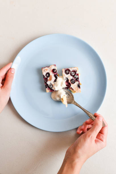 istock cottage cheese pie with berries. eating with a spoon. view from above 1216771784