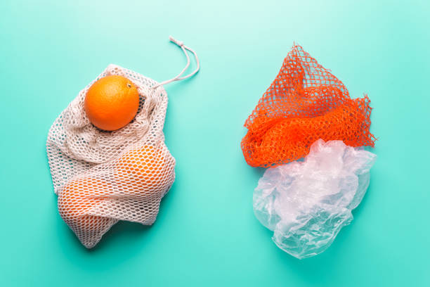 istock String bag and plastic packet for food on a turquoise background, eco friendly going to the supermarket concept 1216771787