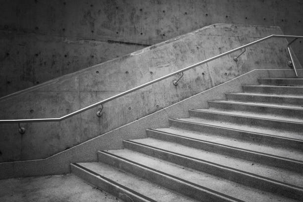 istock Stairway leading up and abstract geometric concrete architecture 1216773170