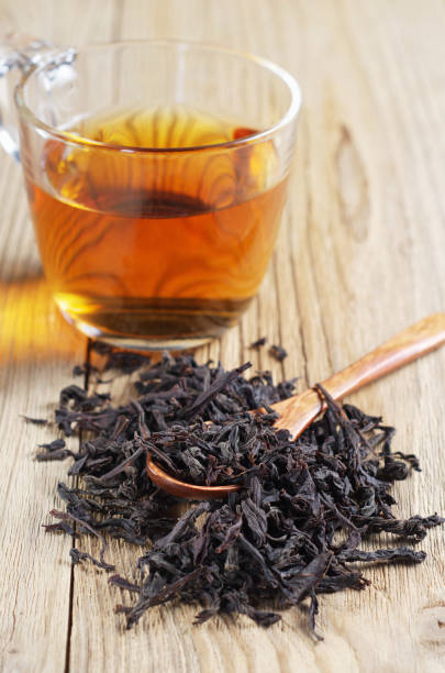istock Cup of tea with dried large leaves 1216776070