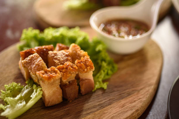 Crunchy roasted pork belly with lettuce