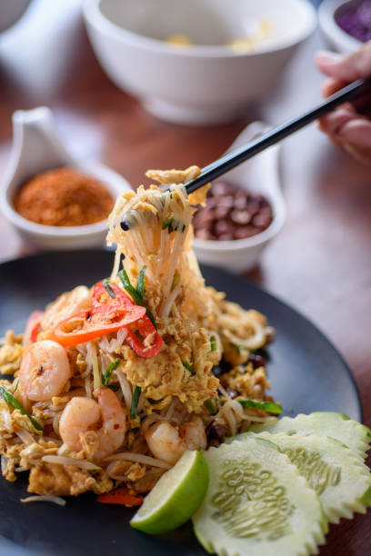istock Thai style stir fried rice noodles. Phad Thai with shrimp 1216783177