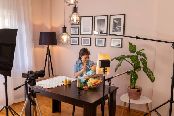istock Vlogger recording video about baby nutrition 1216784445