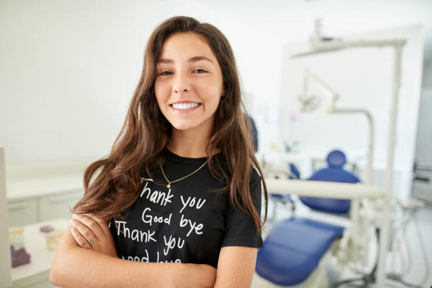 i am at my dentist for dental treatment - teenager teenage girls women dentist imagens e fotografias de stock