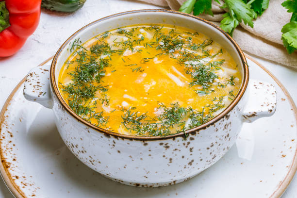 istock Chicken soup bouillon in a plate 1216785526