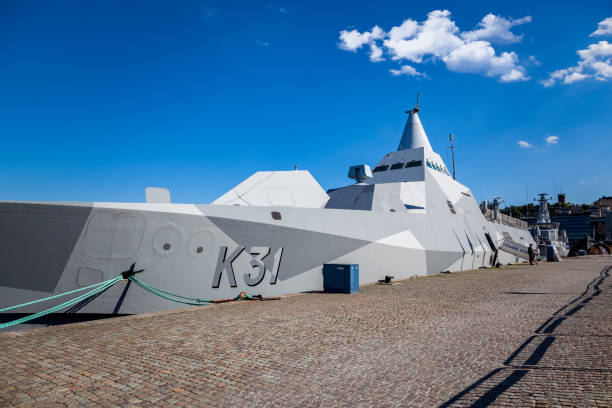 Stockholm, Sweden - June 7, 2013: Summer view of a Swedish modern stealth warship moored at the quay. Public family fun day with the Swedish navy in Stockholm Sweden June 7, 2013.
