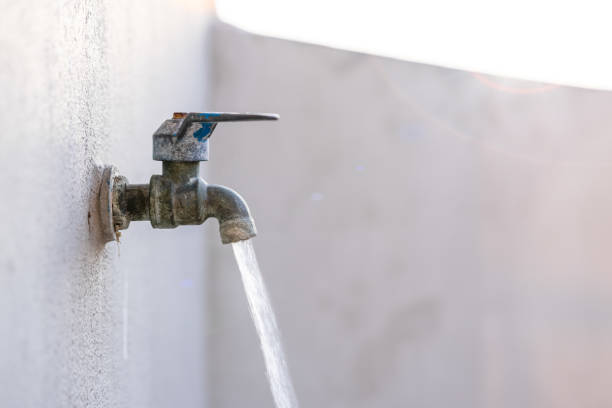 istock Old tap that is opening and running water , Water saving concepts 1216786774