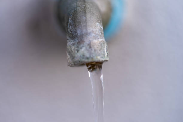 istock Old tap that is opening and running water , Water saving concepts 1216786775