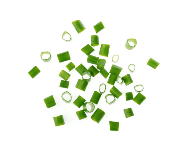 istock chopped green onions isolated on white background 1216787072