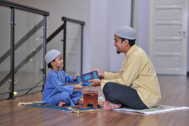 istock Muslim family worship during ramadhan 1216787181